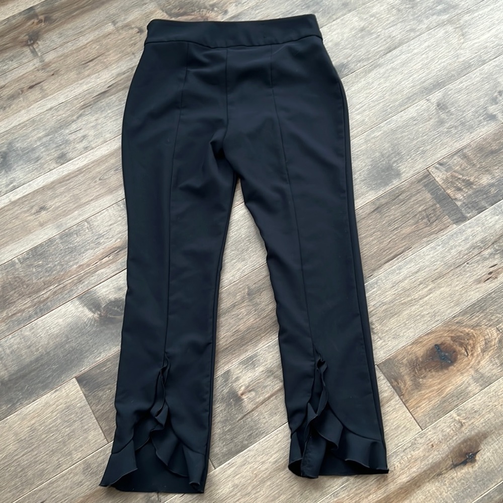 Black ruffle back pants